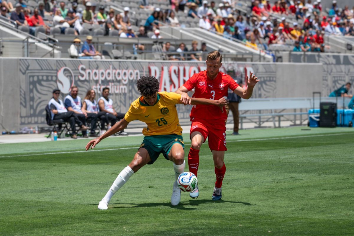 Australian defender Lucas Herrington blocks Swiss player Silvan Widmer from attacking at the Switzerland Vs. Australia World Cup game Saturday, June 6 at Snapdragon Stadium
