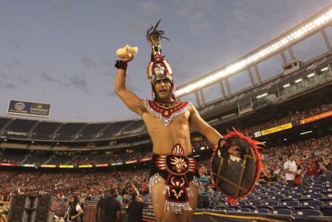Photo Editor Antonio Zaragoza captured this shot as SDSU fans welcomed one of two new Aztec Warriors, Oscar Deleon, at the first football game of the season.