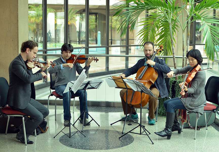 The Hausmann Quartet: left to right: Guillaume Pirard, Issac Allen, Alex Greenbaum, and 